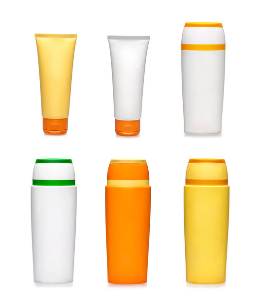 Six samples of generic containers. Beauty goods. Sunscreen bottles on white background - Photo, Image