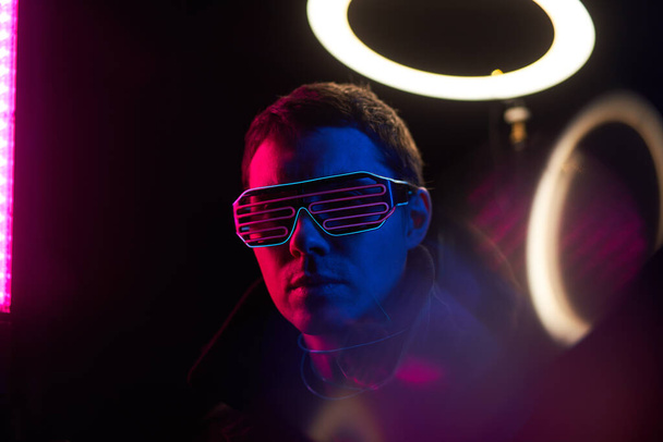 Cyberpunk style portrait of man in futuristic costume. - Fotografie, Obrázek