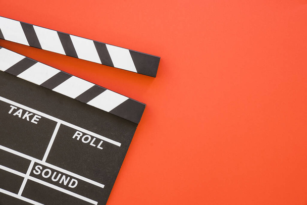 clapperboard on red background with space. Resolution and high quality beautiful photo - Photo, Image