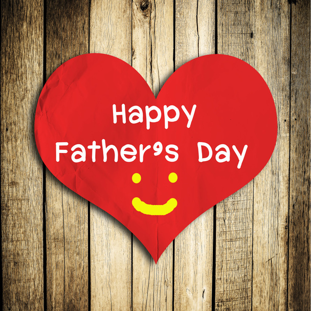 Happy Father's day word on red heart shape with wooden wall - Foto, Bild
