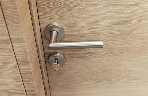wooden room door with metal handle, close up - Photo, Image