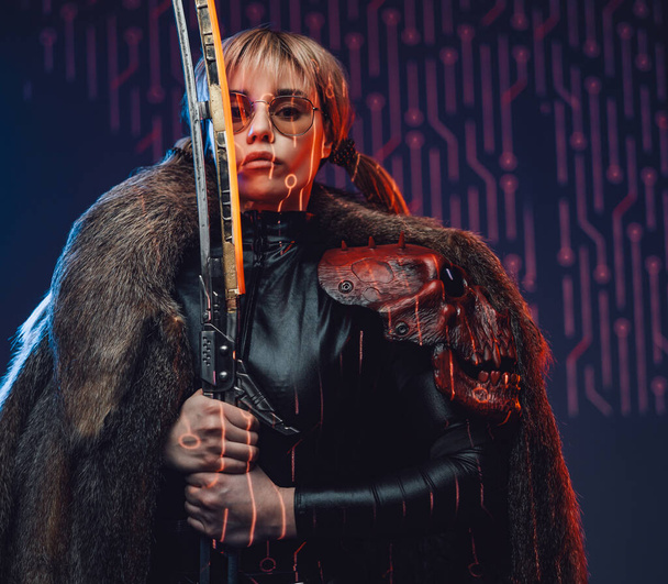 Cyberpunk girl with fur and glowing sword - Photo, Image