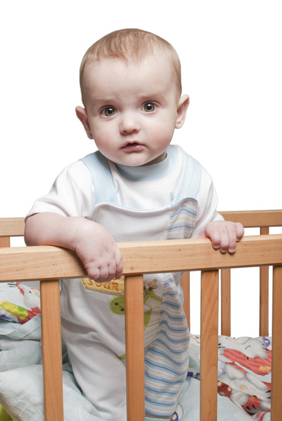 Little baby boy standing in the crib - Photo, Image