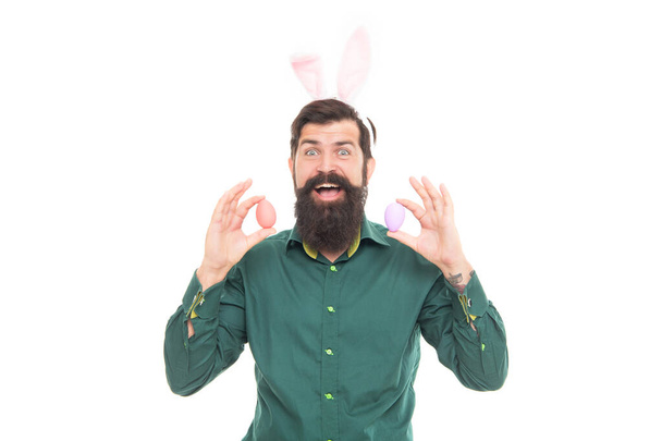 happy man in rabbit ears ready for bunny hunt holding easter eggs, easter hunt - Foto, afbeelding