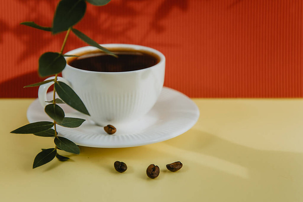 breakfast with a cup of black coffee on a colored background  - Fotoğraf, Görsel