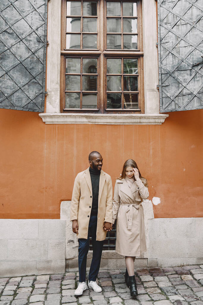 Mixed couple spenting time together in a spring city - Foto, Imagem