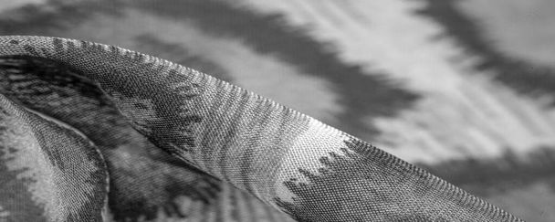 монохромна шовкова тканина, гепардова шкіра, тема африканської савани. Текстура тла, візерунок
 - Фото, зображення