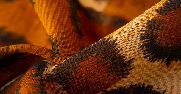 Light fine silk fabric, cheetah skin, brown. African savanna theme. Background texture, pattern - Photo, Image