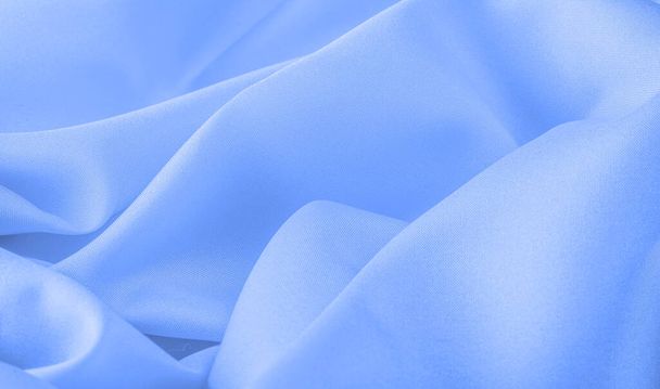 Mavi ipek kumaş, zarif dalgalı mavi saten, lüks kumaş, soyut tasarım. arkaplan dokusu, desen - Fotoğraf, Görsel