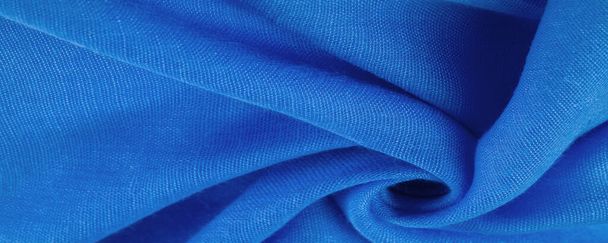 Textur. Hintergrundstoff von seidenblauer matter Farbe (Farbe oder Oberfläche) ist matt und flach, ohne Glanz. - Foto, Bild