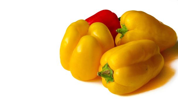 Bell peppers are sometimes grouped with less pungent pepper varieties as sweet peppers. - Photo, Image