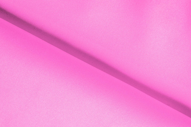 rosa Seidenstoff, schön glatt elegant, wellig, purpurrosa Satin Seide Luxusstoff, abstraktes Design. Hintergrund Textur, Muster - Foto, Bild