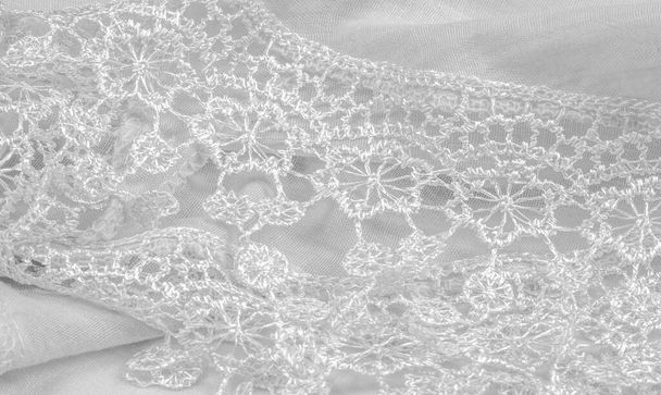 Spring white silk with lace capes. Sleek, elegant white silk or luxe satin can be used as an abstract background. Background texture, postcard template - Photo, Image