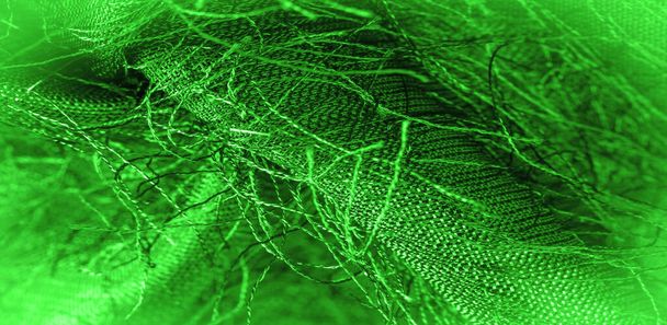 Tissu de soie vert, fils tissés sur tissu, effet moelleux. Texture de fond, ornement décoratif - Photo, image