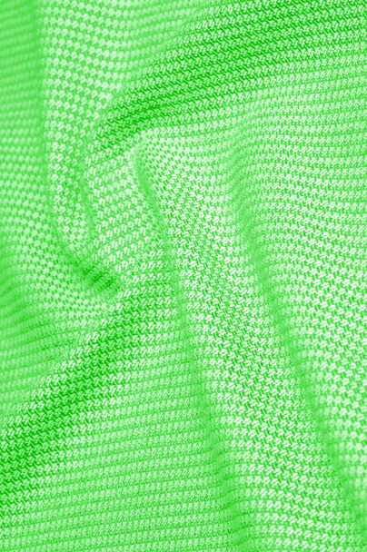 Textura de fondo, patrón Tejido de lana tibia con un hilo verde cosido. Para aquellos influenciados por los clásicos, tómate este matiz vintage mezclado con oliva, verde y esmeralda - Foto, Imagen