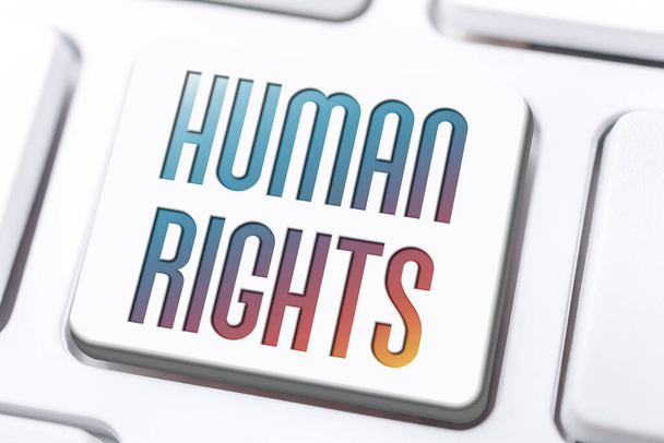 Ihmisoikeudet kirjoitettu näppäimistön painikkeella - Valokuva, kuva