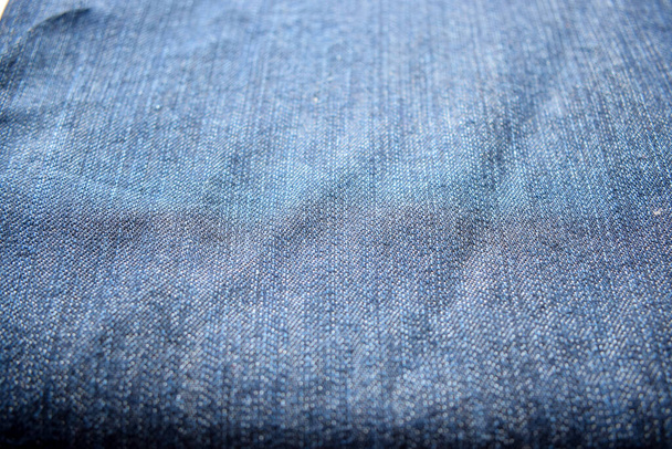 Джинсовая текстура синих джинсов для заднего плана - Фото, изображение