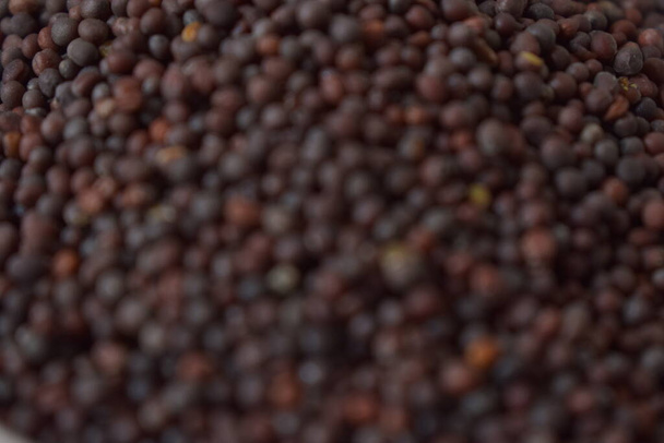 Mustard seeds as an abstract background texture - Photo, Image