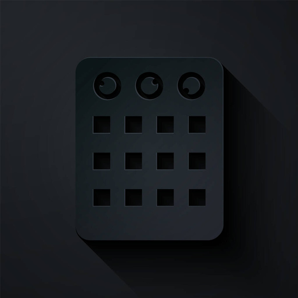 Paper cut Drum machine icon isolated on black background. Musical equipment. Paper art style. Vector. - Vector, Image