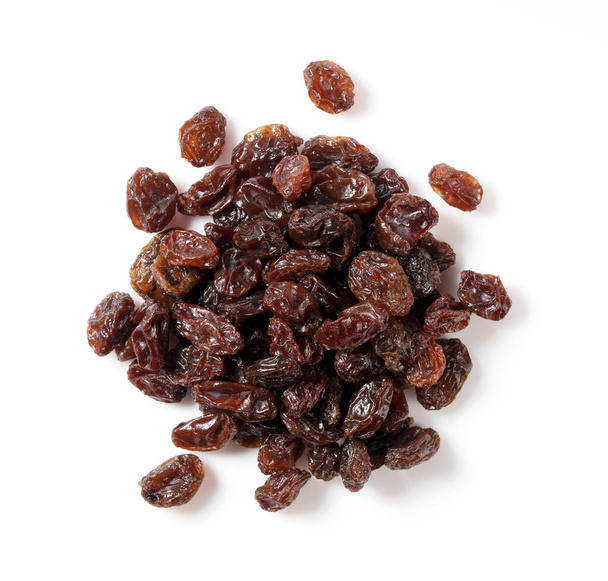 Raisins placed on a white background. View from above. - Photo, Image