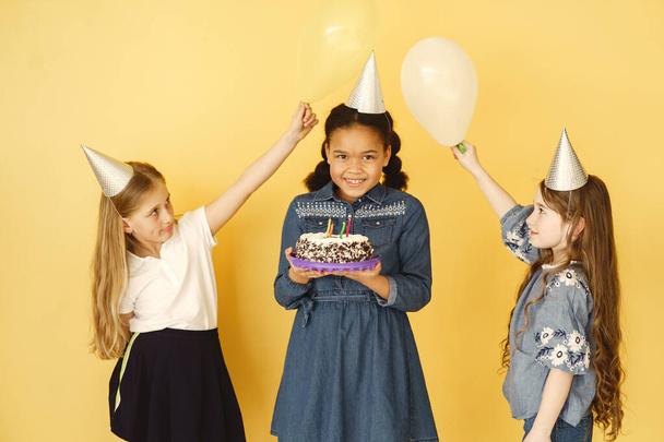 Little African girl celebrate her birthday with friends - Photo, image