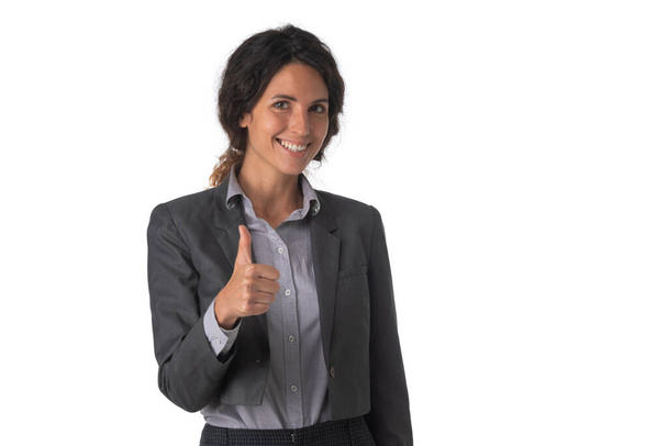 Portrait of young business woman with thumb up studio isolated on white background - Foto, afbeelding
