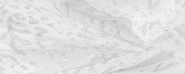 Seidenstoff, schneeweißer Stoff. Zarte Blütenschattierungen auf weißem Hintergrund, Foto von Paisley-Print. Textur, Muster, Kollektion - Foto, Bild