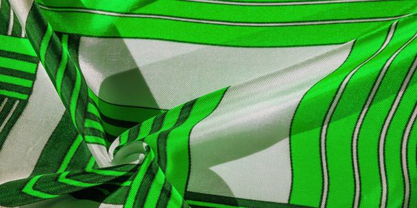 緑と白の縞模様の絹織物。メキシコの動機を持つポンチョ。テクスチャ背景 - 写真・画像