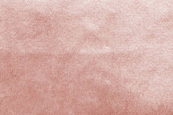 Rose goud roze fluwelen achtergrond of velours flanellen textuur gemaakt van katoen of wol met zachte fluffy fluweelzachte satijnen stof doek metallic kleur materiaal    - Foto, afbeelding