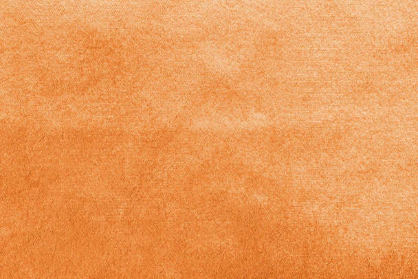 Fond de velours or cuivré ou texture de flanelle de velours jaune doré en coton ou laine avec tissu satiné velouté doux et velouté matériau de couleur métallique    - Photo, image