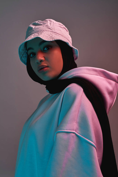 Pretty young arabian girl in hijab and panama hat - Zdjęcie, obraz
