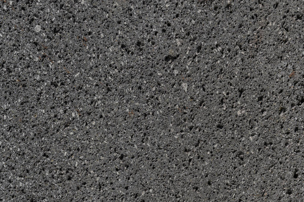 A closeup shot of the rough surface of a concrete wall - Foto, afbeelding