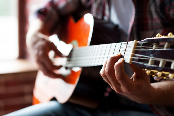 Man playing guitar. - Фото, зображення