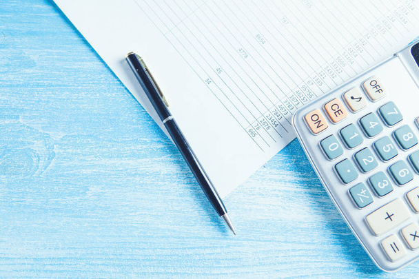 Close up calculator and financial report - accounting concept - Fotografie, Obrázek