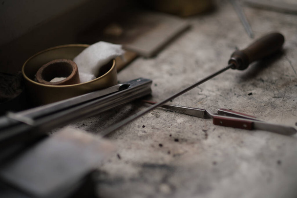 Still life of goldsmiths tools. realistic photograph of a jewelers workplace - Foto, imagen