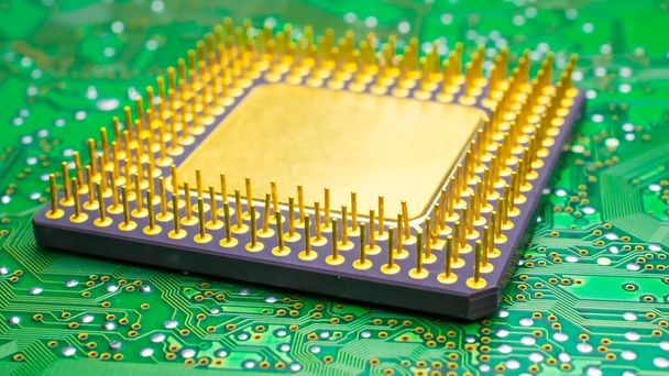  gold-plated micrichip green printed circuit. background - Photo, Image