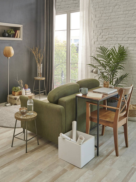 Grijze stenen muur in de woonkamer, groene fauteuil, rieten stoel, oranje lamp en werktafel, laptop en nis. Moderne interieur stijl. - Foto, afbeelding