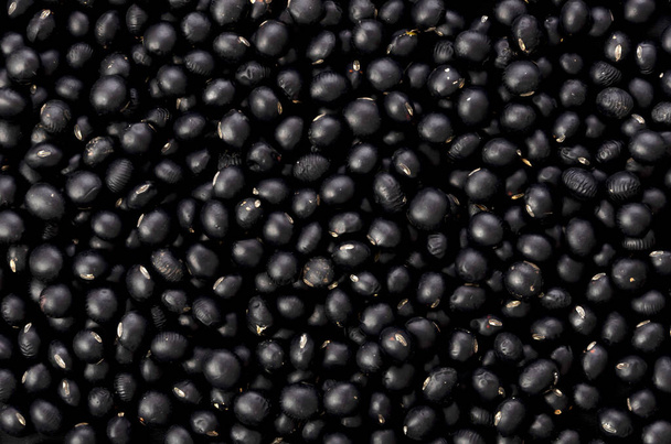 Raw  black beans background, close-up,  - Foto, Bild