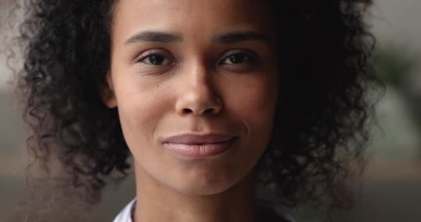 Close up portrait African woman having wide white toothy smile - Felvétel, videó