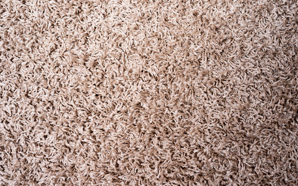 Tapis de tapis beige sans couture fond de texture d'en haut, tapis texture motif plancher, vue de dessus. tapis fleecy beige, image haute résolution de texture de tapis doux gris - Photo, image
