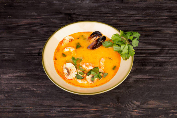 tomato puree soup with seafood, champignons and greens - Valokuva, kuva