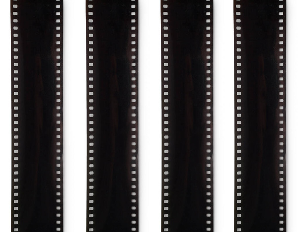 Filmband 35 mm. Streifenfilm für die Fotografie ist isoliert auf weißem Hintergrund. - Foto, Bild
