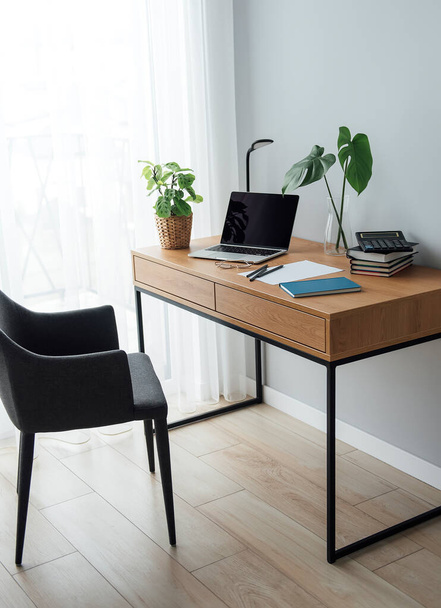 Office workplace with laptop on wooden table - Foto, imagen