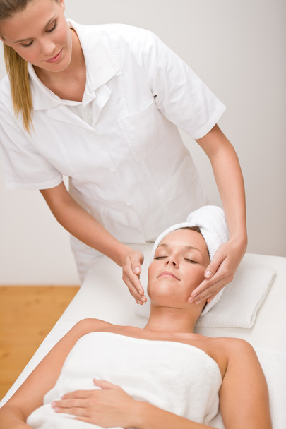Body care - woman at face massage - Valokuva, kuva