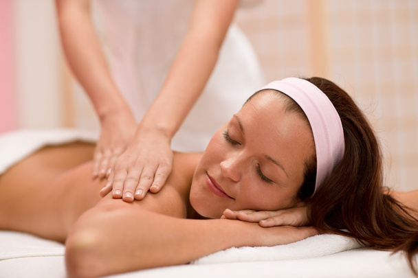 Body care - woman back massage at day spa massage - Fotó, kép