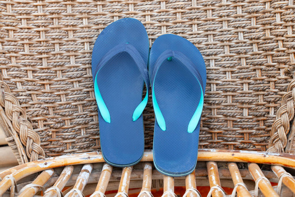beach rubber shoes on wooden background close up - Photo, Image