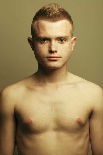 Male beauty concept. Portrait of fashionable and undressed young - Photo, Image