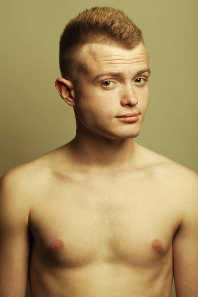 Male beauty concept. Portrait of fashionable and undressed young - Фото, зображення