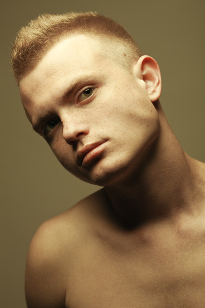 Male beauty concept. Portrait of fashionable and undressed young - Zdjęcie, obraz