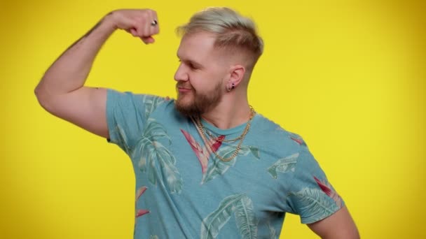 Man showing biceps, feeling power strength to fight for rights, energy to gain success win fight - Footage, Video